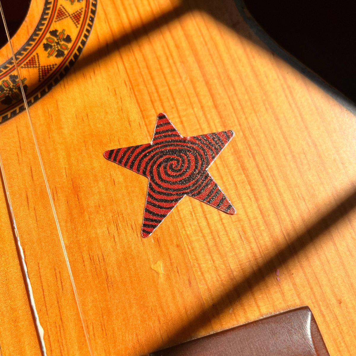 Red Swirl Star Sticker